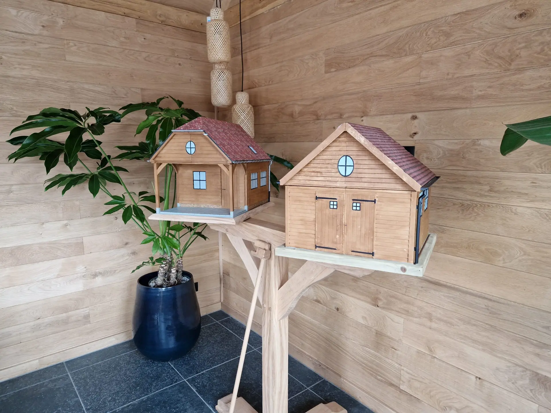 3D prints van gedetailleerde miniatuurhuizen als schaalmodellen, afgewerkt met realistische texturen.
