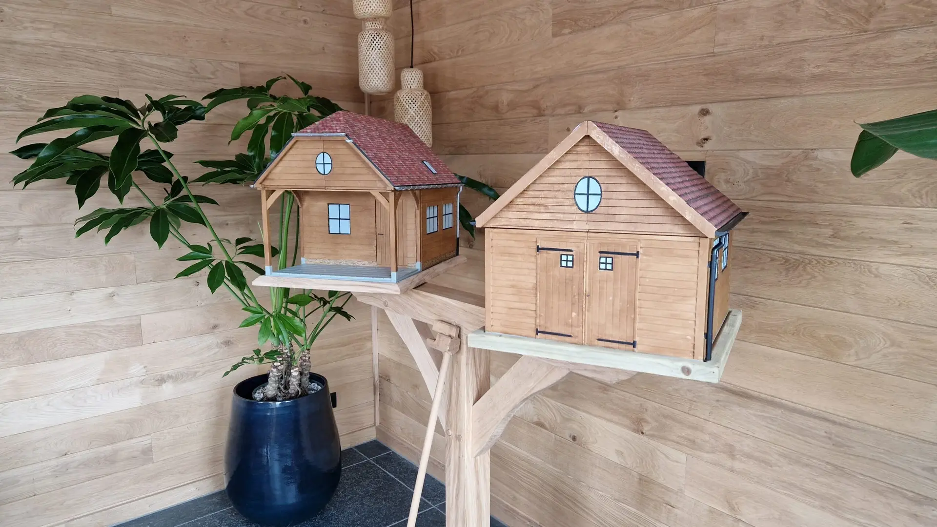 3D prints van gedetailleerde miniatuurhuizen als schaalmodellen, afgewerkt met realistische texturen.